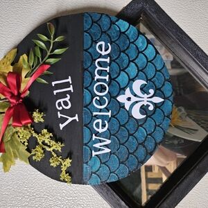 Black and Blue Welcome Sign